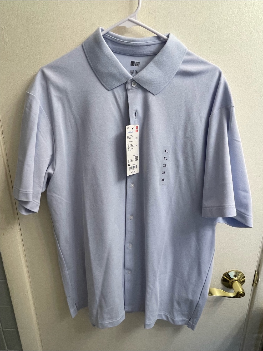 Uniqlo Light Blue Men’s Polo Button-Up